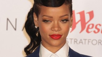 Rihanna weeps to fans on stage