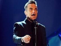Robbie illness stops Take That show