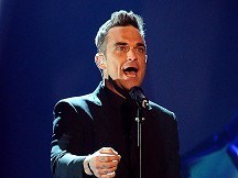 Robbie Williams plans solo tour