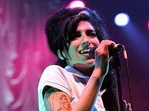 Seven Winehouse hits set for top 40