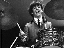 Rare Beatles photos fetch Â£223,000