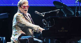 Elton John's still standing on top of the world as most popular artist, survey shows