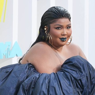 Lizzo breaks down in tears while accepting first Emmy Award