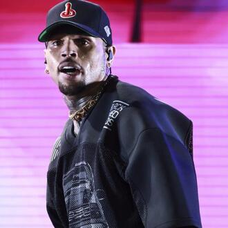 Chris Brown housekeeper seeks arrest warrant